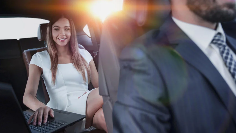 Confident adult woman enjoying a city ride